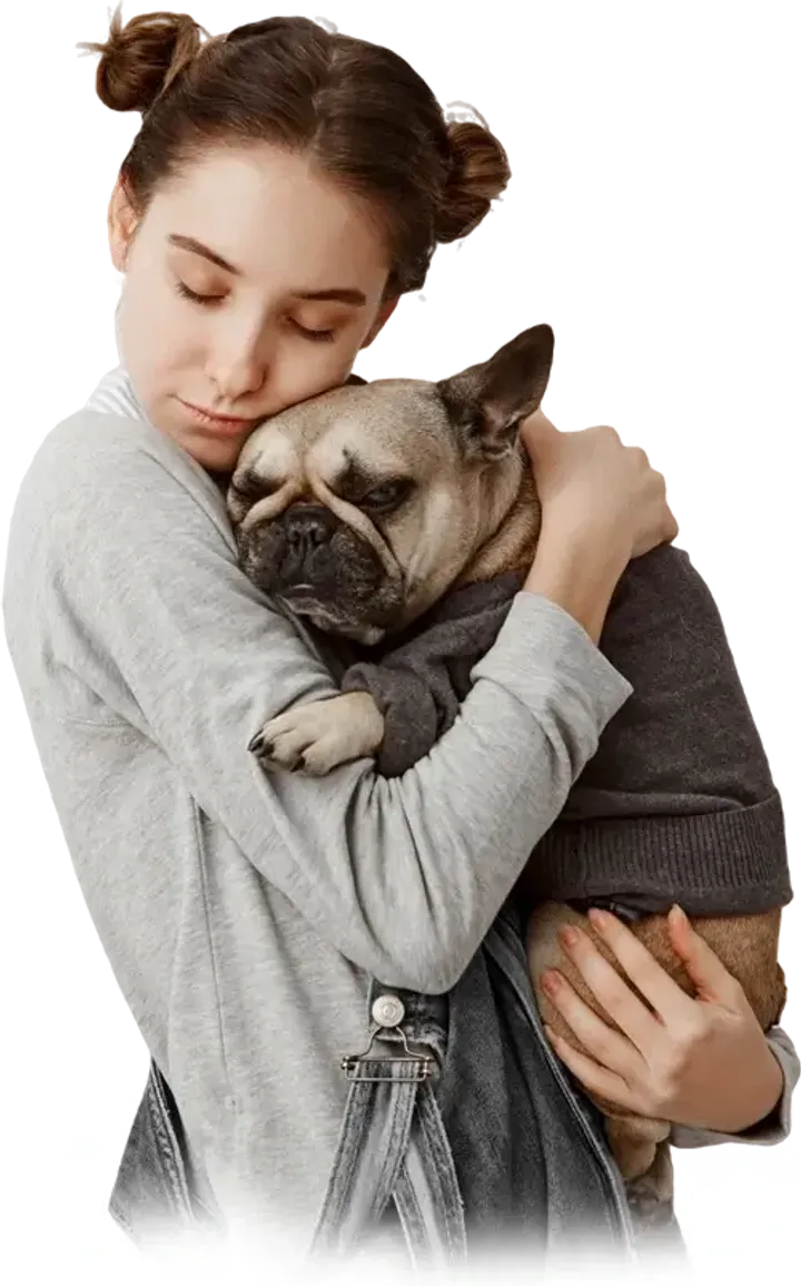 Köpeğine sarılan bir kadın